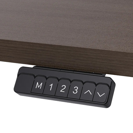 Reid walnut electric standing desk with black frame in a home office