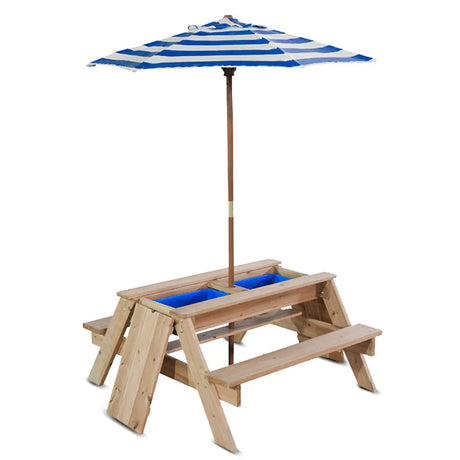 Child playing at the sand and water table