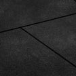 Large coverage of black bevelled edge rubber gym floor tiles in a commercial gym
