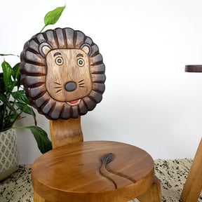 Bora Bora hand carved raintree wood kids lion chair in a childrens room