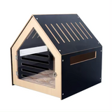 Collie modern dog crate in black with a clear acrylic perspex door and soft cushion in a living room
