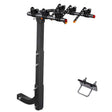 Foldable three bike hitch rack carrying bicycles behind a vehicle