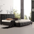 Hurstville king bed in black PU leather with a button tufted headboard in a luxurious master bedroom