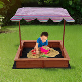 Wooden sandpit with adjustable multi coloured canopy