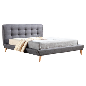 Concord queen bed in grey linen with a button tufted headboard in a refined bedroom