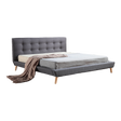 Concord king bed in grey linen with a button tufted headboard in a refined master bedroom