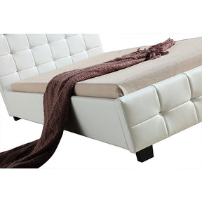 Hurstville king single bed in white PU leather with a padded headboard in a fresh modern bedroom