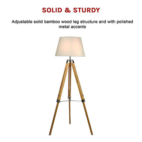 Wood tripod floor lamp with white fabric shade and chrome accents
