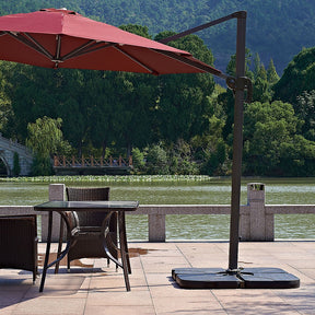Marbella black HDPE cantilever umbrella base 4pcs on a patio