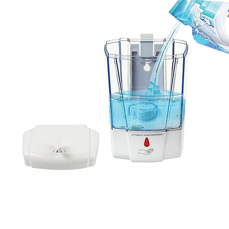 Hand held under the infrared sensor as the dispenser releases a 1 mL dose of soap