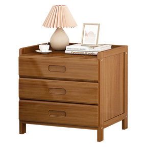 Bangalow dark wood bamboo three drawer bedside table styled in a calm coastal bedroom