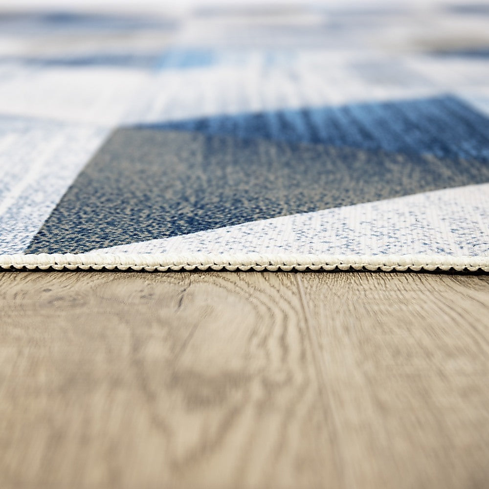 Triangle geometric polypropylene floor rug blue 200x300cm