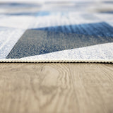 Triangle geometric polypropylene floor rug blue 200x300cm