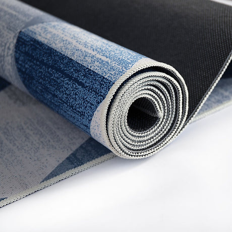 Triangle geometric polypropylene floor rug blue 200x300cm