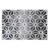 Geometric polypropylene floor rug black and white 200x300cm