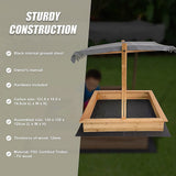 Wooden sandpit interior with ground sheet