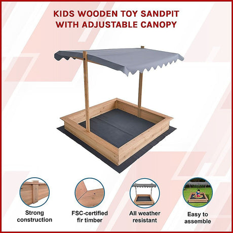 Kids playing in wooden sandpit with canopy