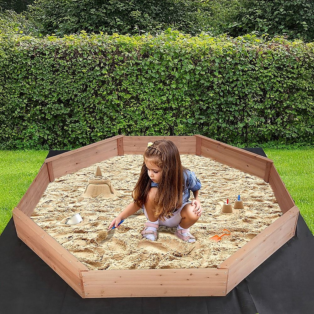 Wooden octagonal sandpit with bench seats