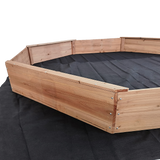 Wooden octagonal sandpit with bench seats