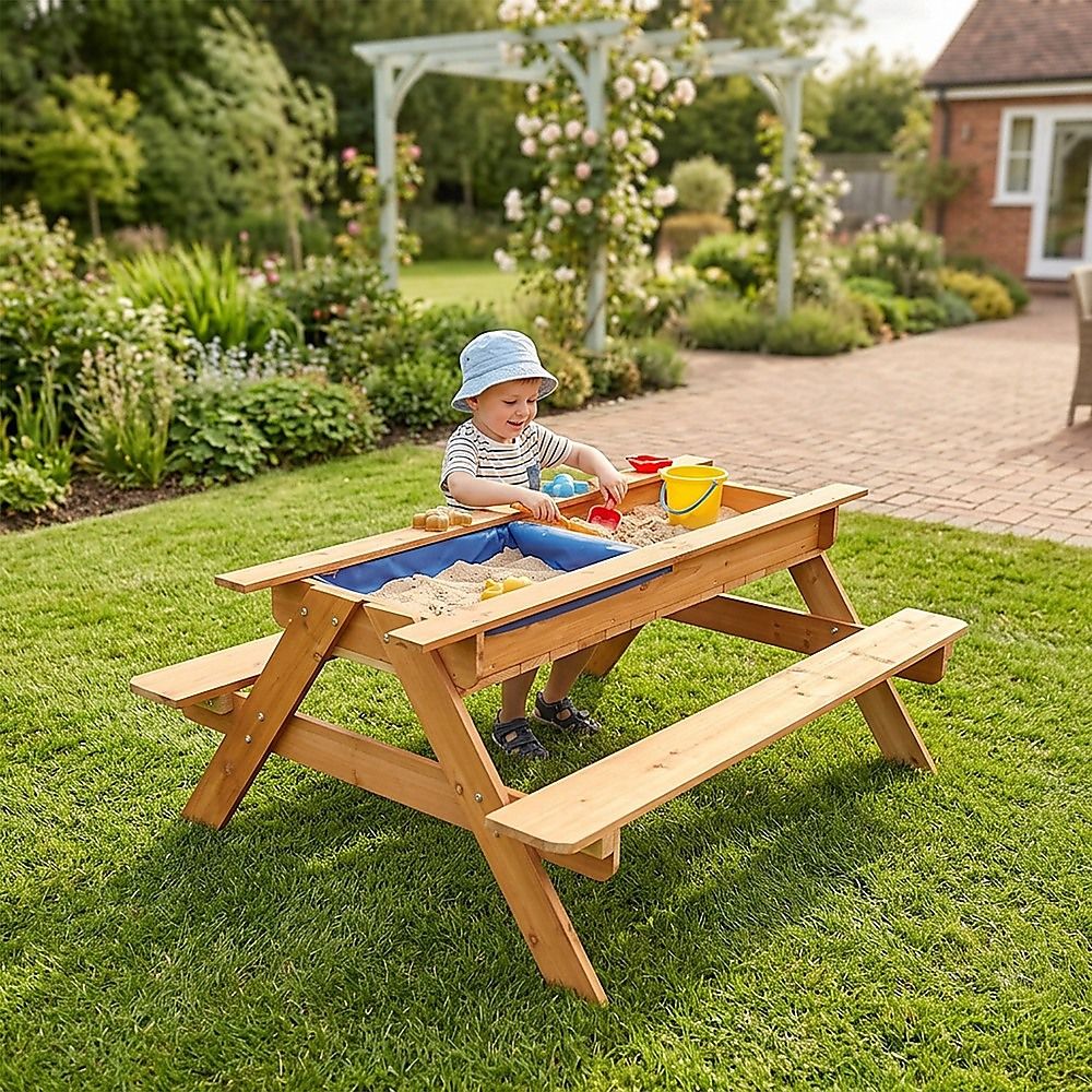 Wooden picnic table with lift up sand and water panel