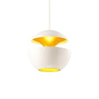 Rapallo white dome pendant with gold interior above a restaurant table