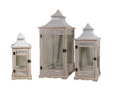 Set of three Aegean style wooden lanterns in natural and white with glass side panels
