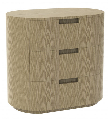 Figueira oak veneer bedside table with drawer storage in a bedroom