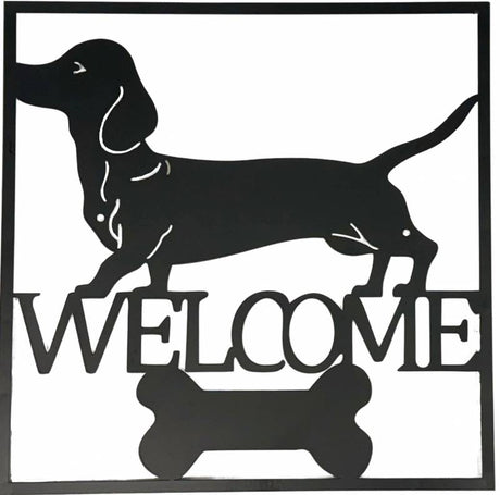 Black metal dachshund welcome wall art 40 cm hanging on a light wall