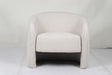Govetts beige and brown fabric occasional chair in a modern living room