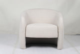 Govetts beige and brown fabric occasional chair in a modern living room