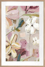 Lush floral composition in a rich vibrant palette framed behind a glass front in a PU frame