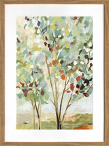 Summer tree print in warm golden tones behind glass in a slim frame