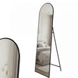 Lorne black metal framed cheval floor mirror in a modern dressing room