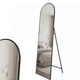 Lorne black metal framed cheval floor mirror in a modern dressing room
