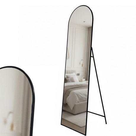 Lorne black metal framed cheval floor mirror in a modern dressing room