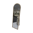 Jan Juc travertine look full length cheval mirror leaning against a bedroom wall