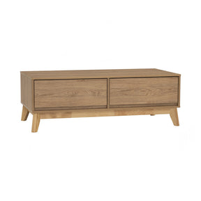 Thornton low profile solid wood coffee table with oak legs in a living room