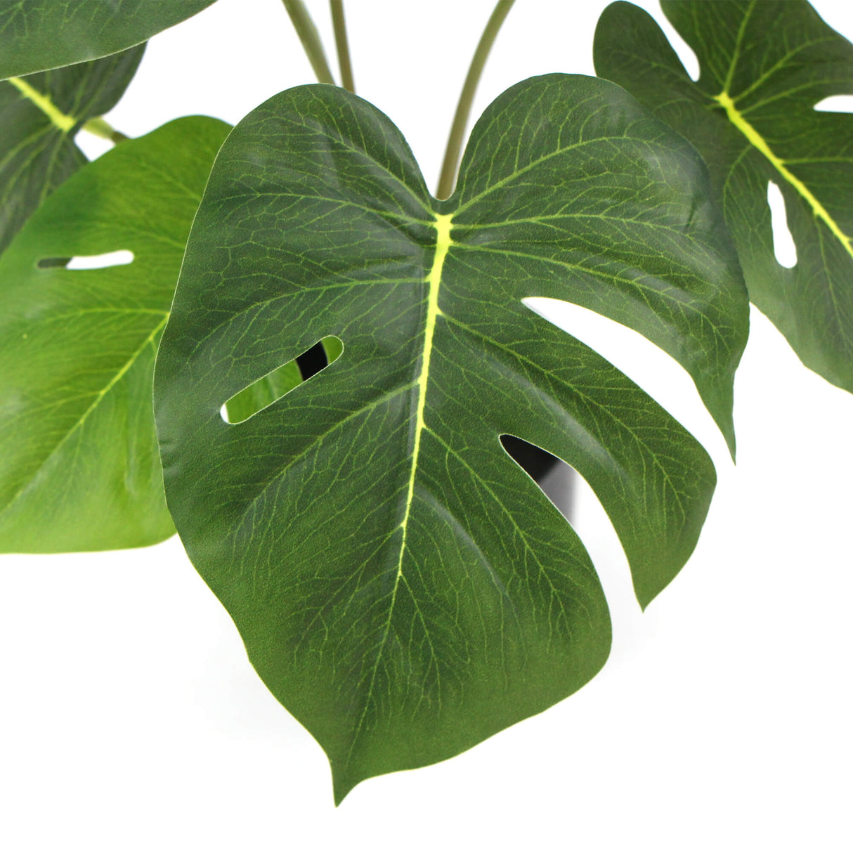 Artificial split philodendron plant styled on desk — Allure Home Collections