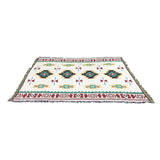 Derwent Bohemian cotton picnic blankets two pack, each 180 x 180cm, in rich vintage colourways spread on the lawn