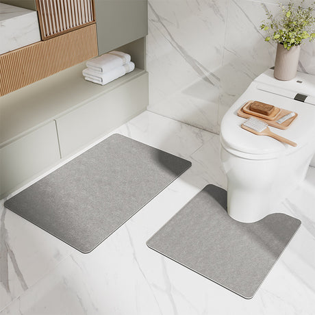 Grey two piece bathroom mat set with U shaped toilet mat and rectangular mat