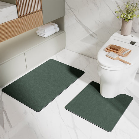 Green two piece bathroom mat set with U shaped toilet mat and rectangular mat