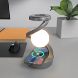 Brigitte black floating night light with RGB glow and wireless charging on a bedside table