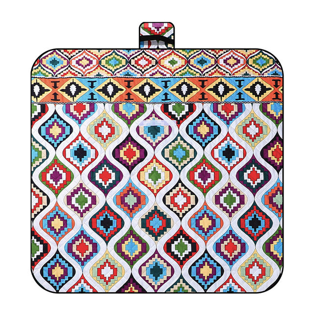 Staveley Morocco pattern picnic blanket 150 x 200cm laid on grass with thickened patterned top and water resistant backing