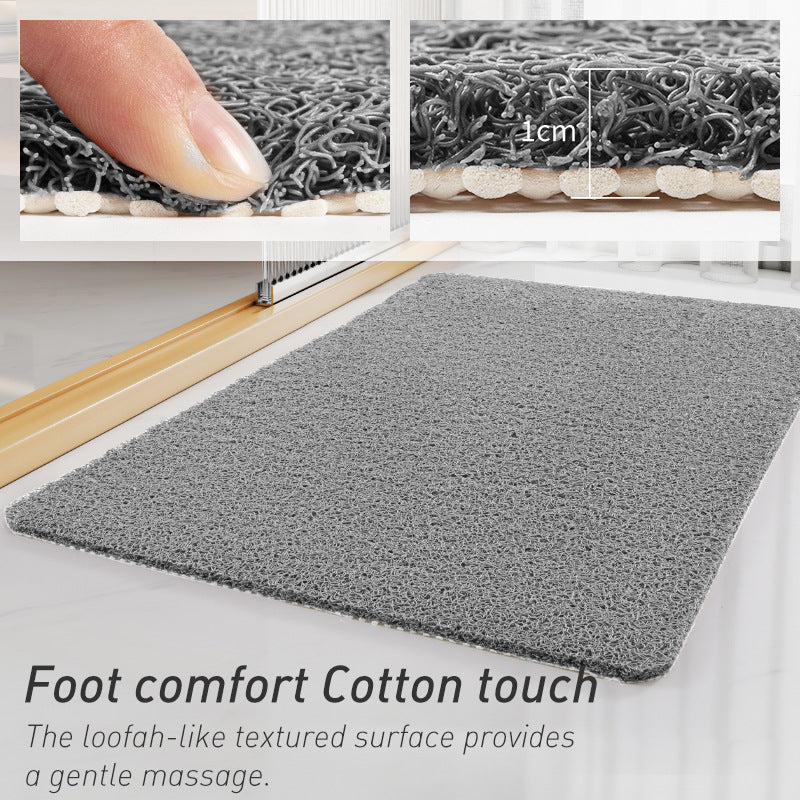 Side view of grey loofah bath mat showing 1 cm foam thickness and backing