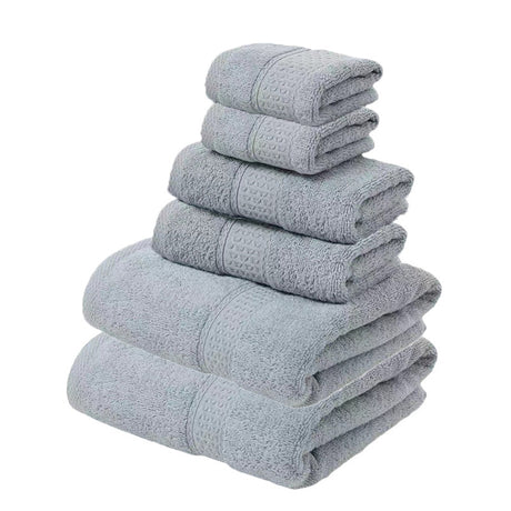 Grey 100% cotton six piece towel set with bath towels, hand towels and face washers folded in a stack