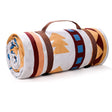 Cartmel traditional geometric picnic mat 200 x 200cm laid on grass in vibrant multicolour polyester with rolled storage bag