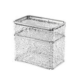 Clear tissue box holder open to show a tissue box loaded inside