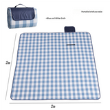 Hawkshead picnic blanket 200 x 200cm in blue and white checkered print laid on grass with soft fabric top and water resistant PEVA backing