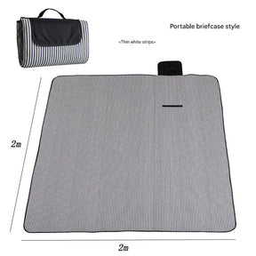 Hawkshead picnic blanket 200 x 200cm in white thin stripe print laid on grass with soft fabric top and water resistant PEVA backing