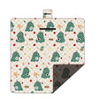 Hawkshead picnic blanket 200 x 200cm in dinosaur print laid on grass with soft fabric top and water resistant PEVA backing